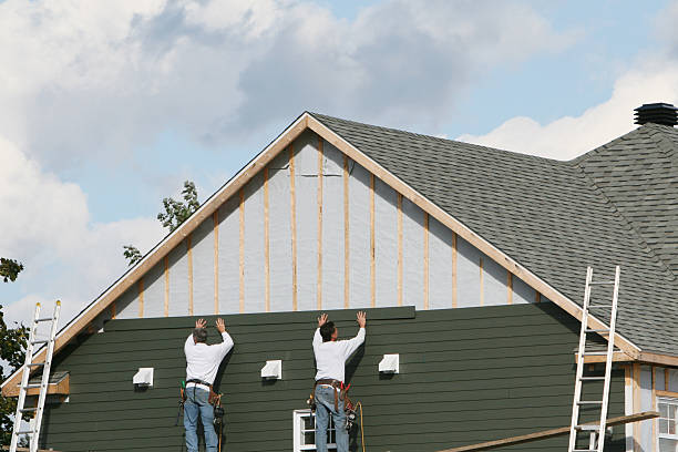 Professional Siding Replacement technician working in Fishing Creek, MD